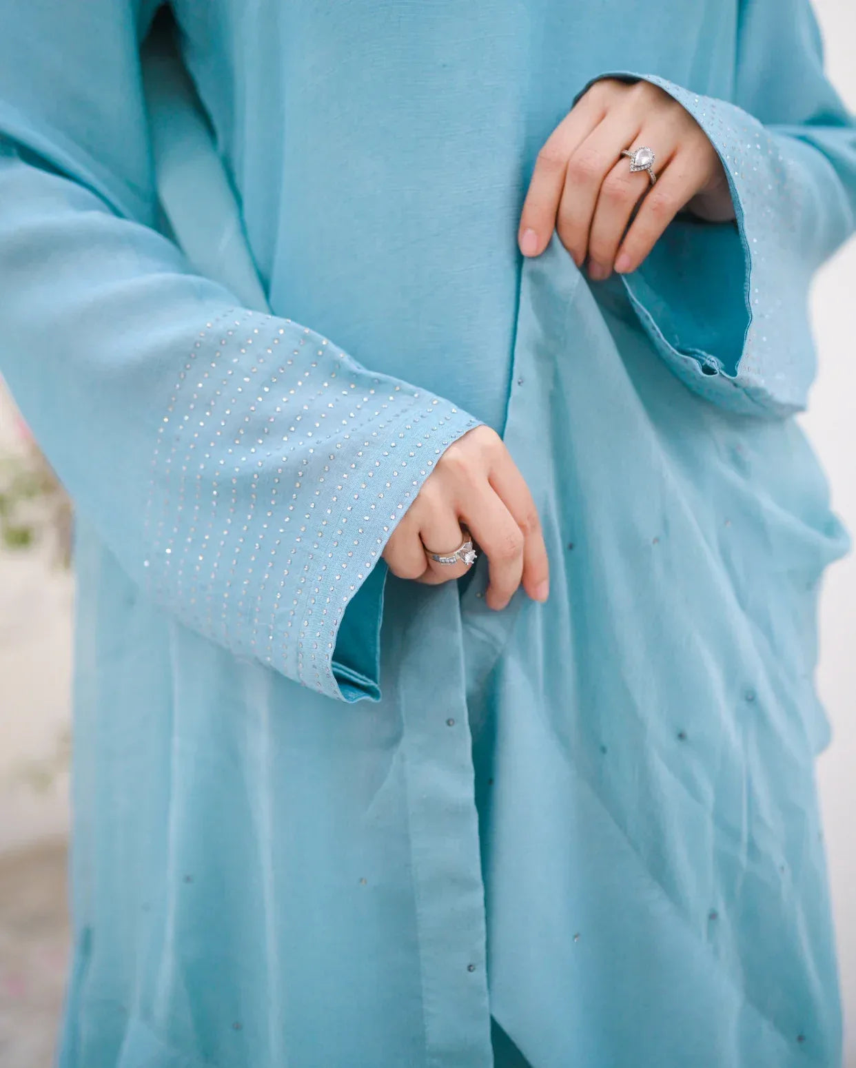 Close up of a stone work of Sleeve and chiffon Dupatta. 